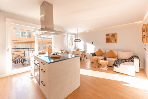 Living room, dining area, kitchen and entrance to terrace of apartment close to Malaga center